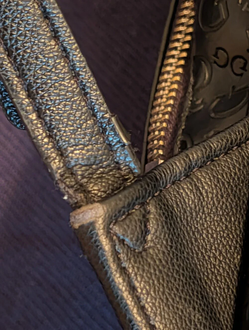 GUESS Black Embossed Logo Mini Backpack with Gold Accent